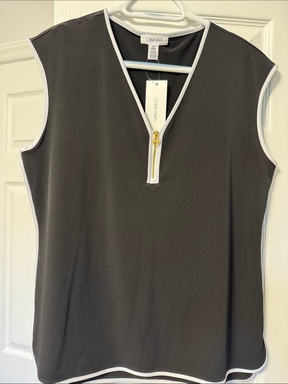 Calvin Klein Black Sleeveless V-Neck Blouse with White Trim and Gold Zip